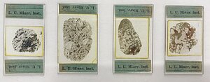 Ieža helsinkīta plānslīpējumi, kas izgatavoti LU Mineraloģijas institūtā 20.gs. divdesmito trīsdesmito gadu mijā un sagatavoti izpētei polarizētas gaismas mikroskopā. Nelielā palielinājumā zem lupas vērojamas atšķirīgas ieža struktūras un tekstūras Otto Meļļa iežu plānslīpējumu kolekcija. Foto: Vija Hodireva