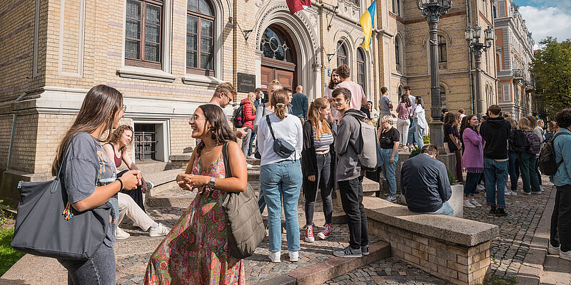 Students on the steps at Raiņa Boulevard 19
